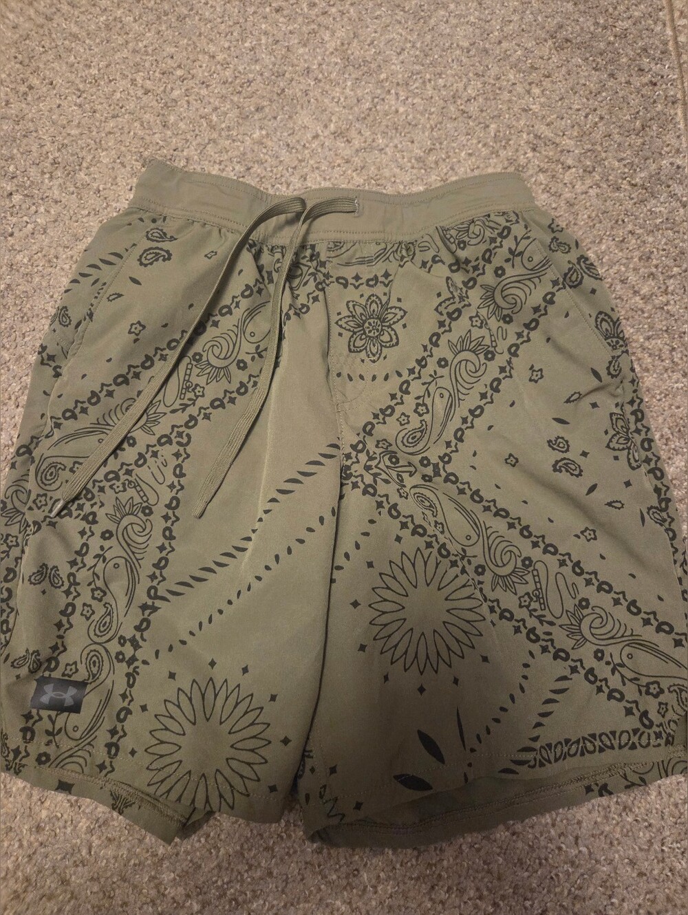 Under Armour olive green shorts with black paisley and floral design, size S #un